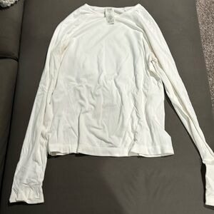white, gently used long sleeve athletic top